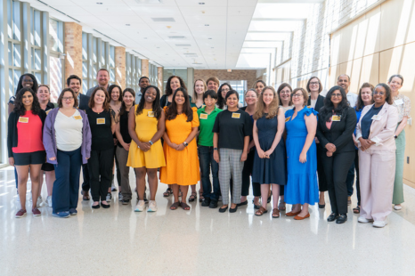 Group photo of ElevateHER conference attendees