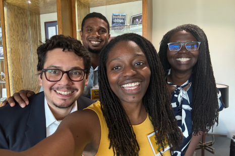 Erika Moore and three others smile for a selfie photo